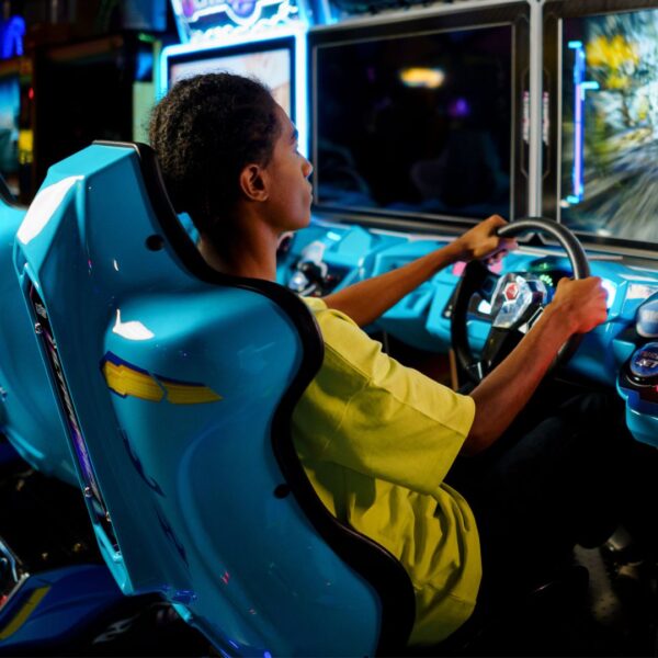 Playing arcade racing game